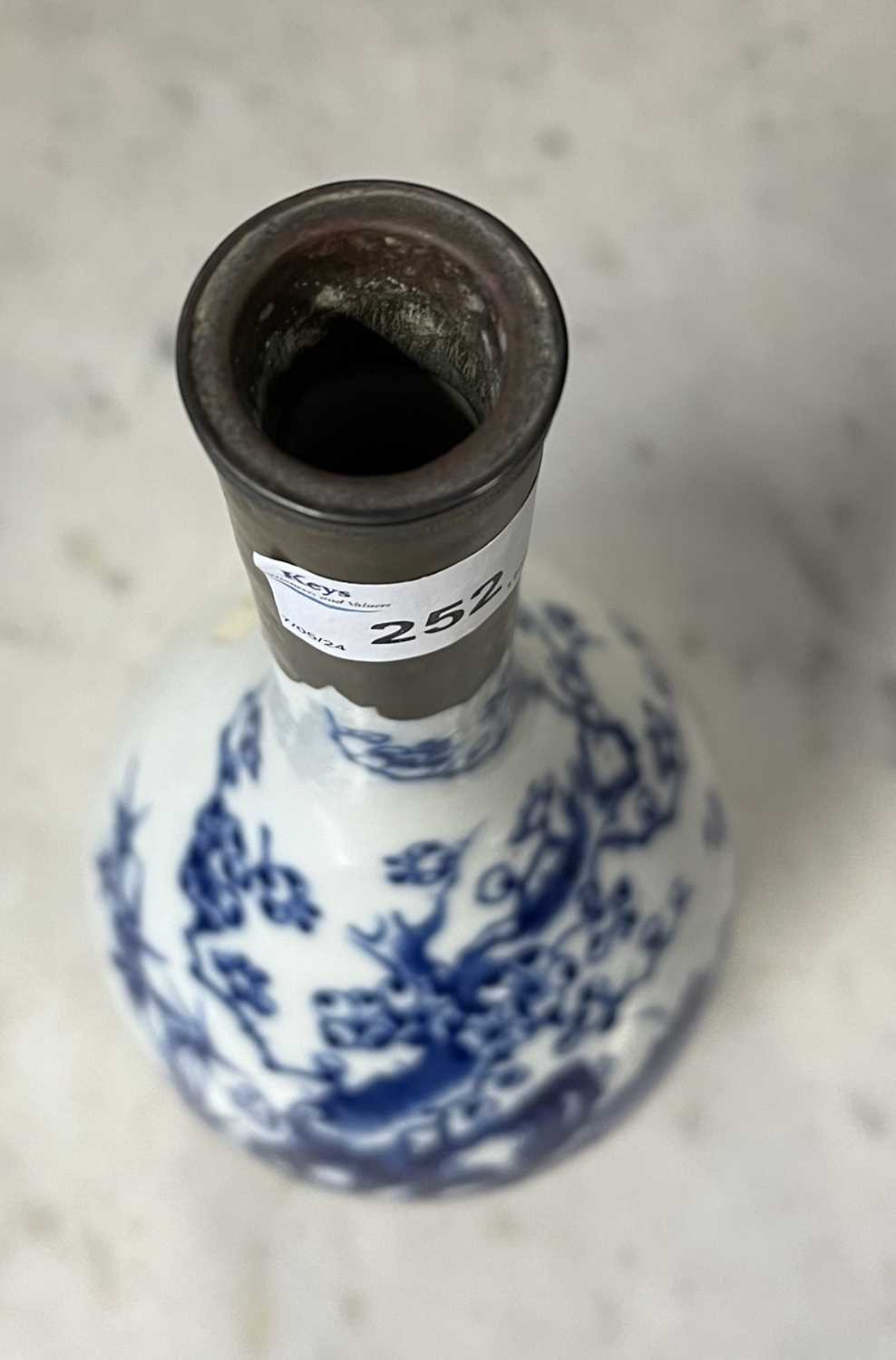 A Chinese porcelain vase, baluster body with blue and white decoration and metal repair to rim - Image 5 of 8