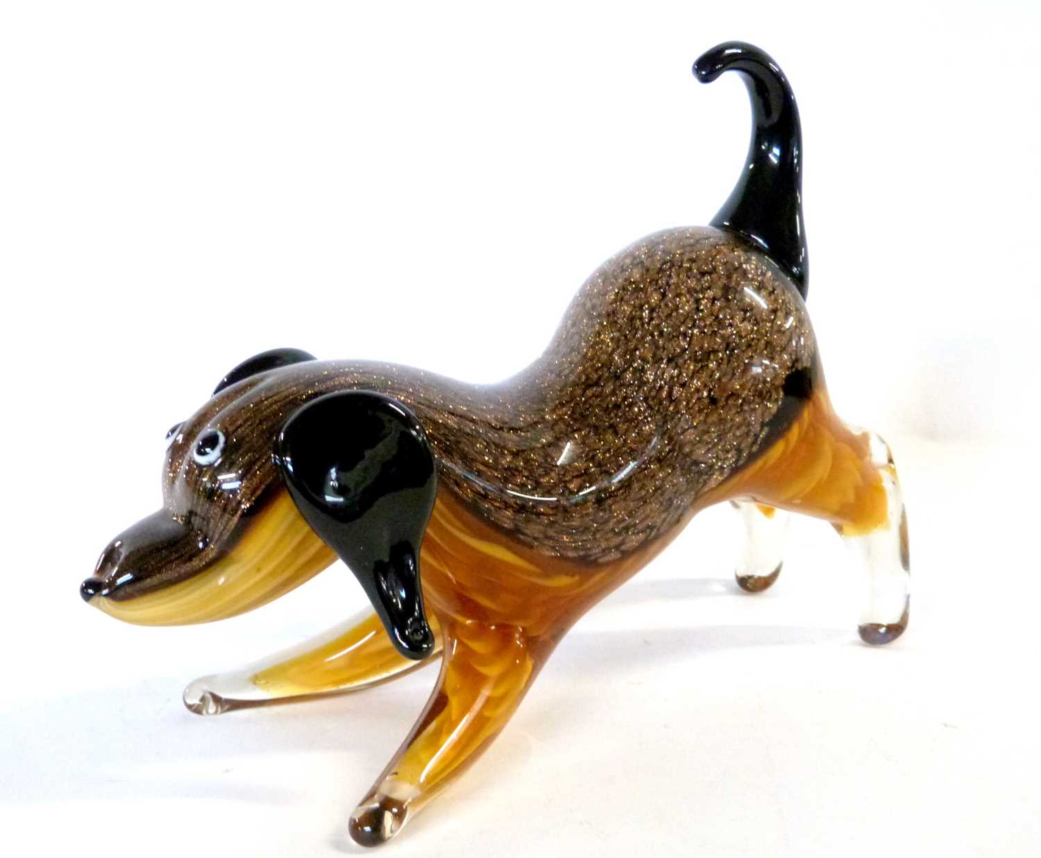 A 1970's Murano glass Vincenzo Nason & Co "Avventurina" range hotworked model of a playing dog, in