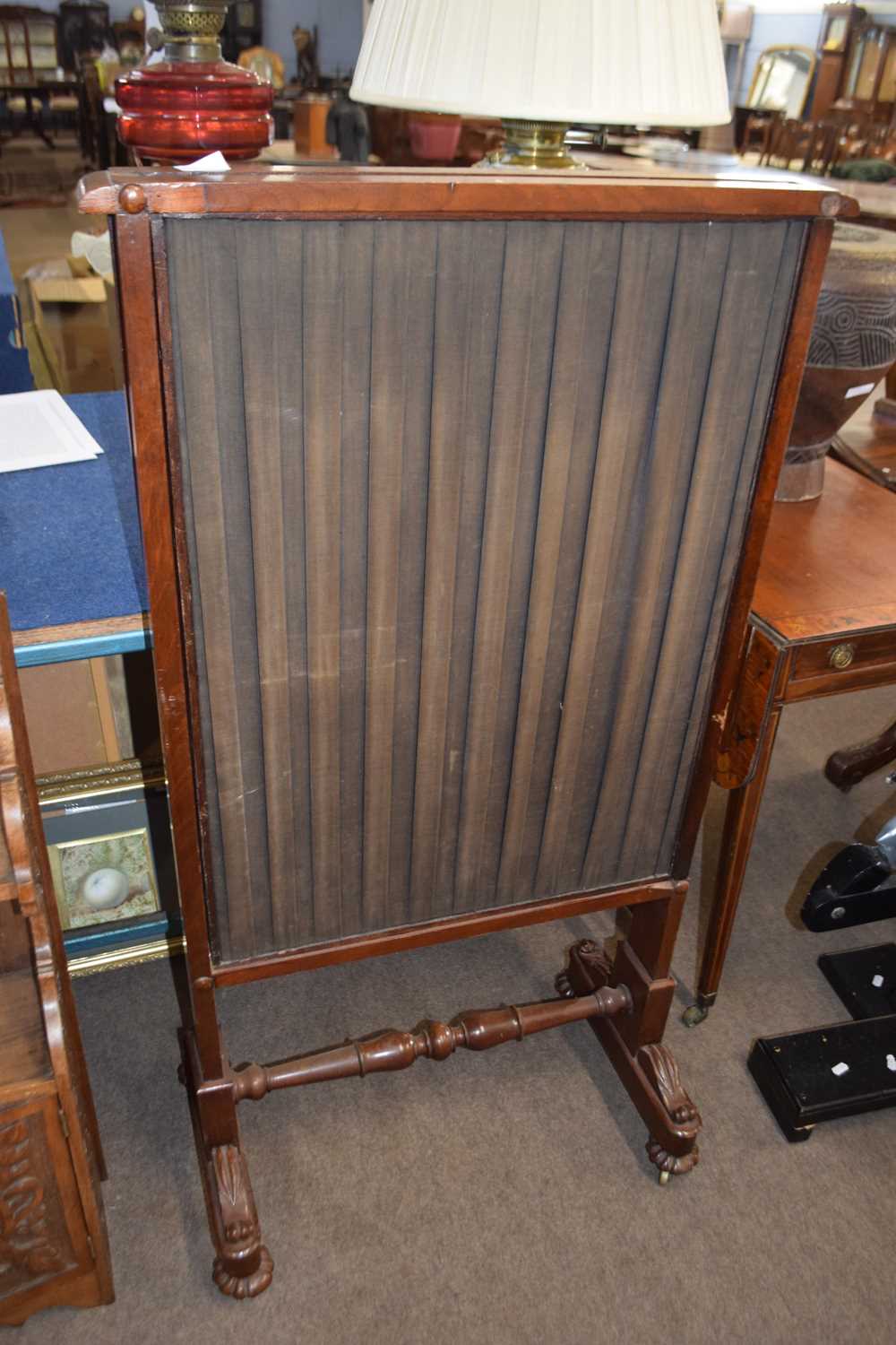 Gillows style mahogany framed fire screen pleated fabric panels and turned central stretcher and