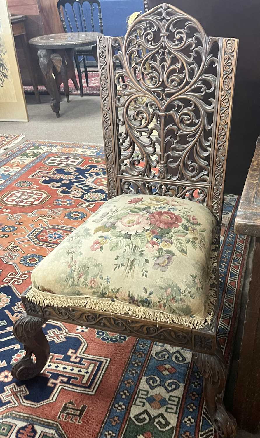 A 19th Century Far Eastern hardwood side chair with pierced back, carved scrolled front feet and a - Image 2 of 4
