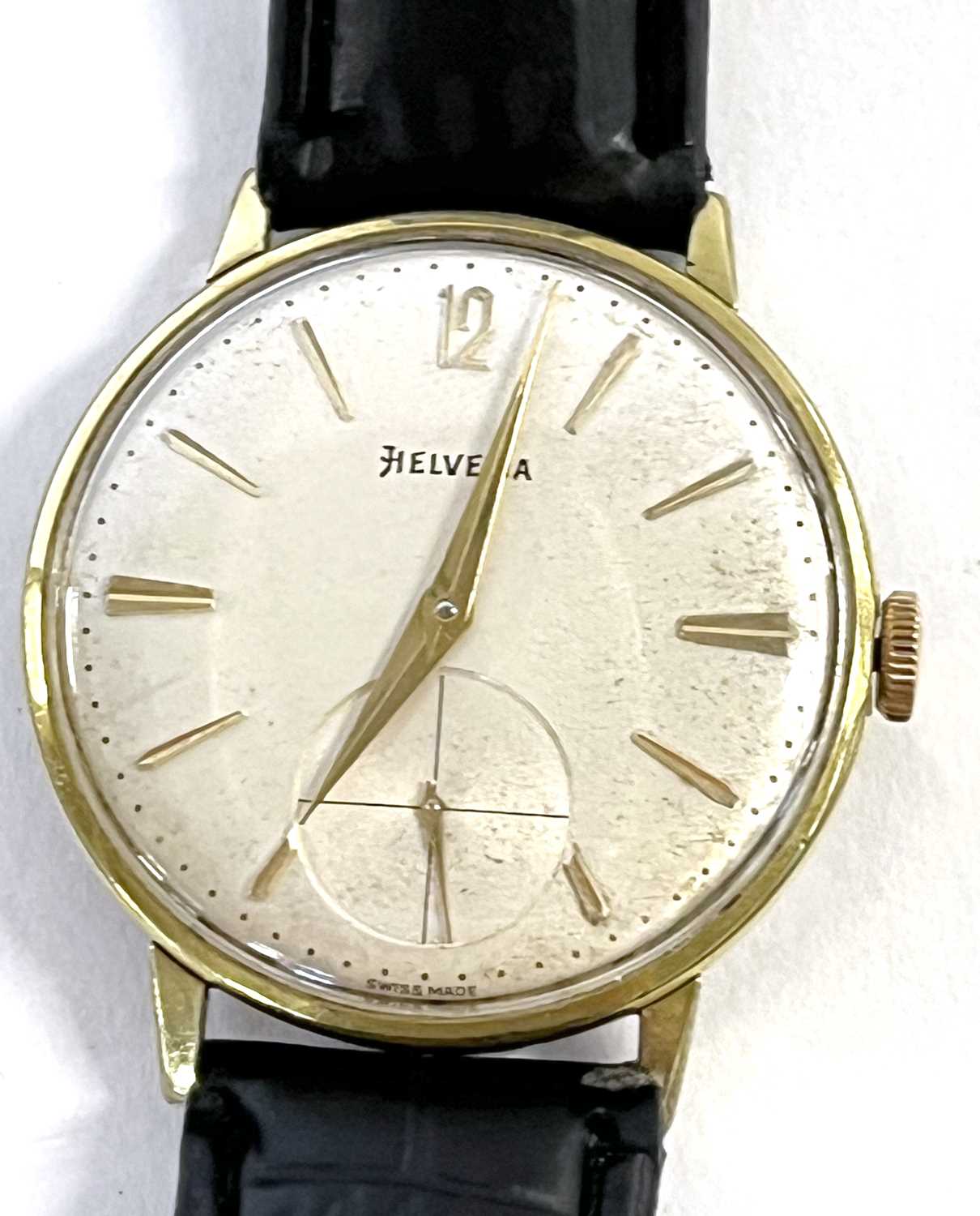 A 1960's Swiss Helvetia gentleman's skeleton-back wristwatch, with arrow hands and baton markers, - Image 5 of 6