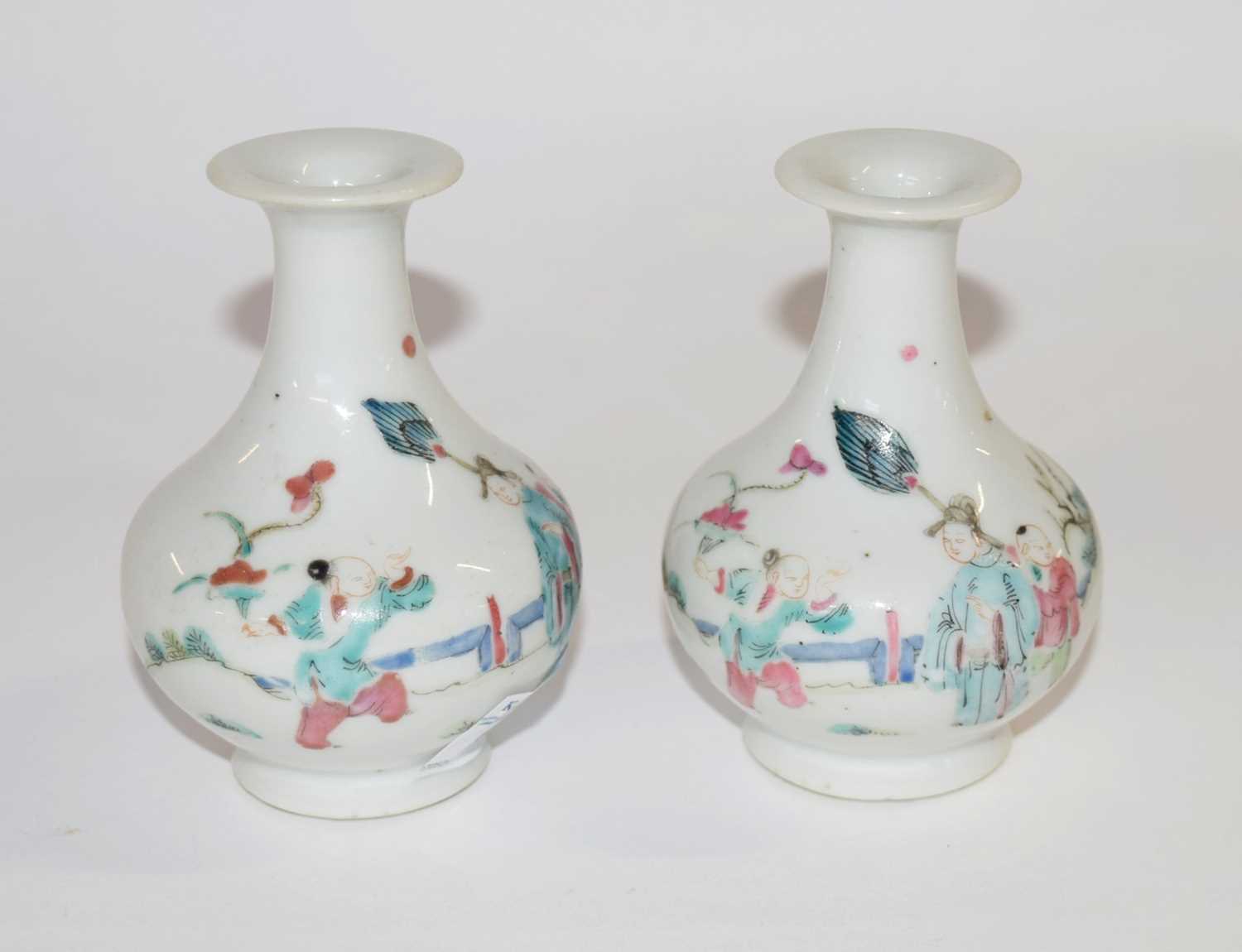 Two 19th Century Chinese porcelain vases of small baluster form decorated with Chinese figures,