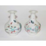 Two 19th Century Chinese porcelain vases of small baluster form decorated with Chinese figures,