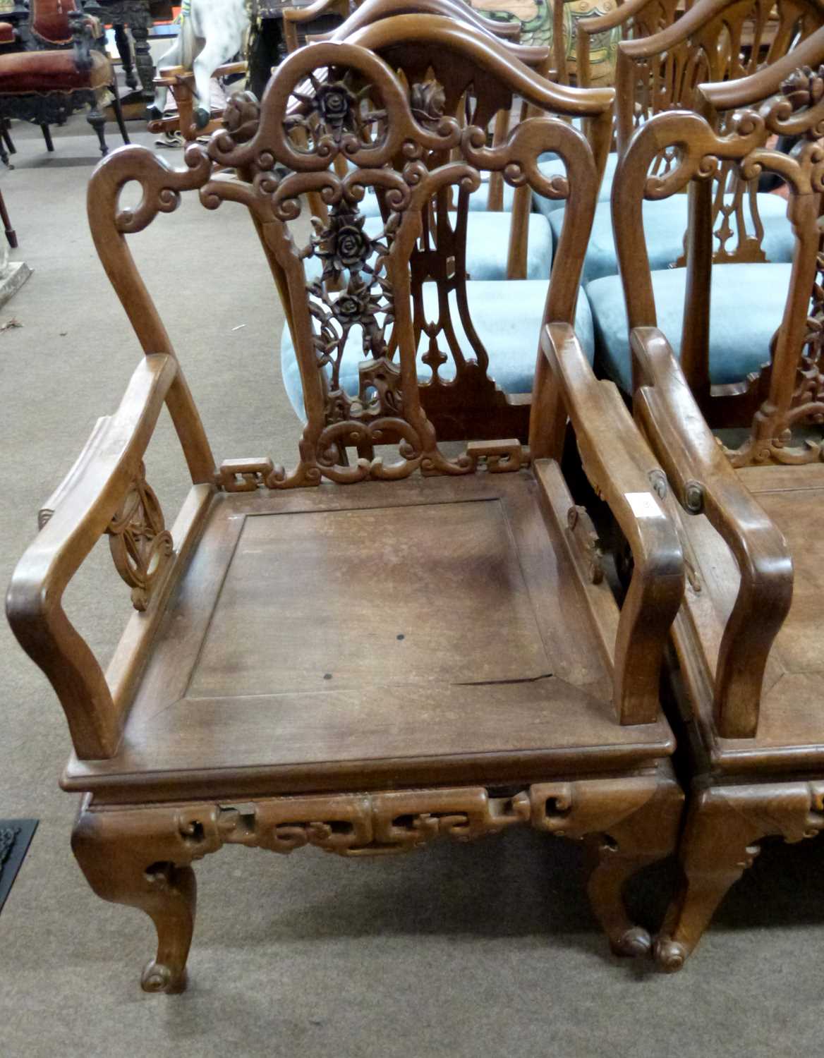 A pair of Chinese hardwood chairs with pierced floral decorated backs, 91cm - Image 2 of 4
