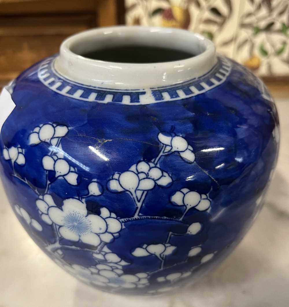 A Chinese porcelain ginger jar 19th Century, the blue ground with prunus decoration, four - Image 8 of 11