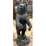 A reproduction resin or composition stick stand in the form of a Black Forest type bear, 87cm high