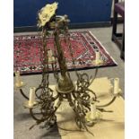 20th Century gilt brass six branch ceiling light fitting with scrolled foliate decoration, 70cm