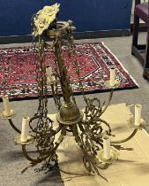 20th Century gilt brass six branch ceiling light fitting with scrolled foliate decoration, 70cm
