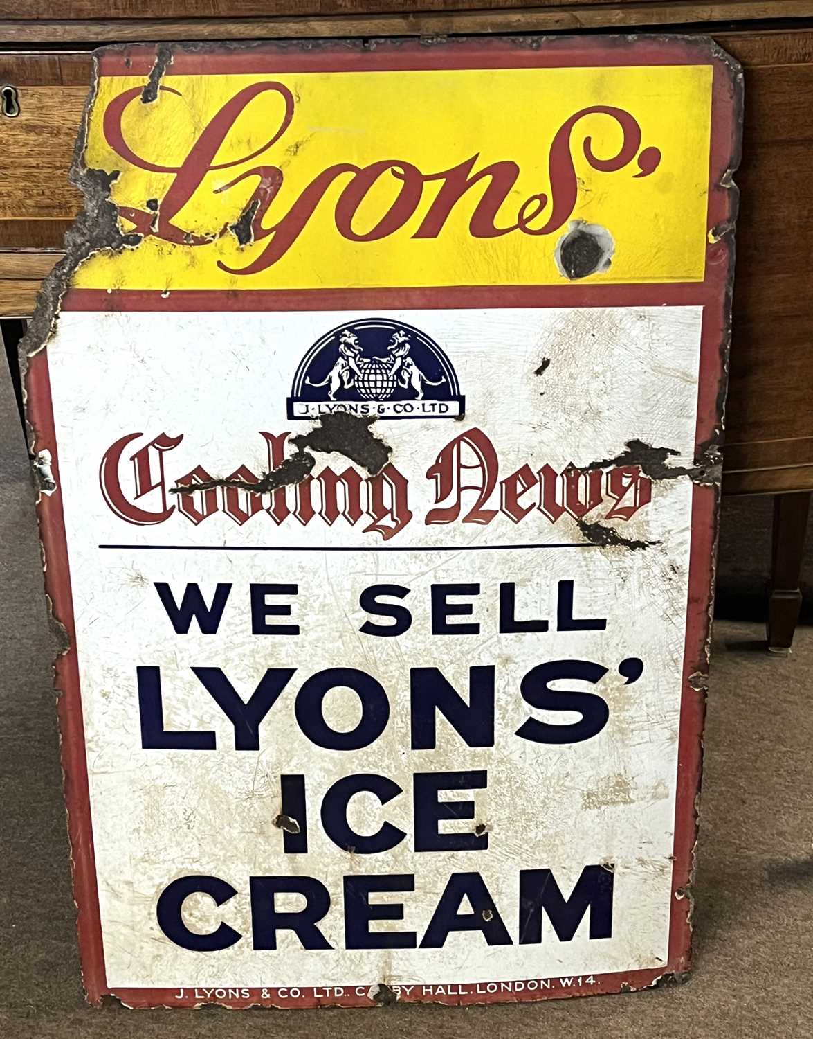 An enamel sign marked Lyons, 89cm high