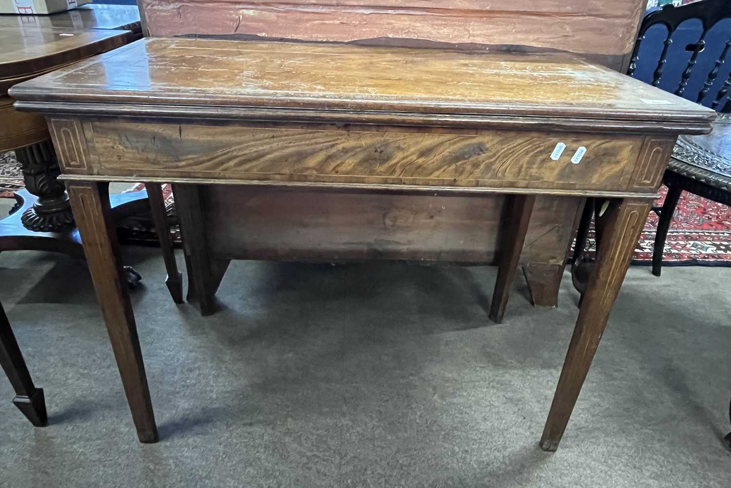 A Georgian mahogany and inlaid tea table of hinged rectangular form set on tapering legs, 92cm wide - Image 4 of 4