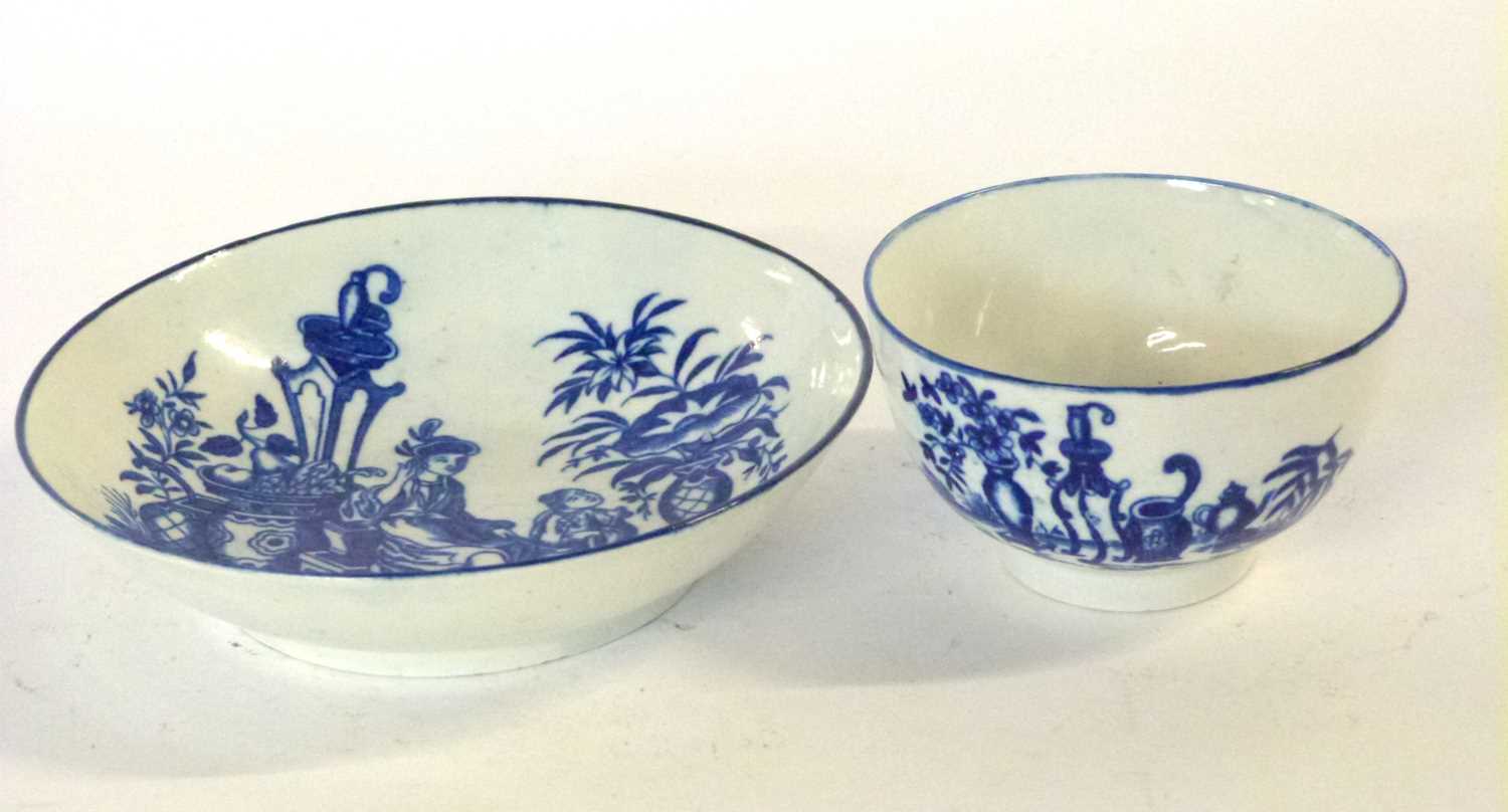 An 18th Century Worcester porcelain tea bowl and saucer decorated in underglaze blue with the mother