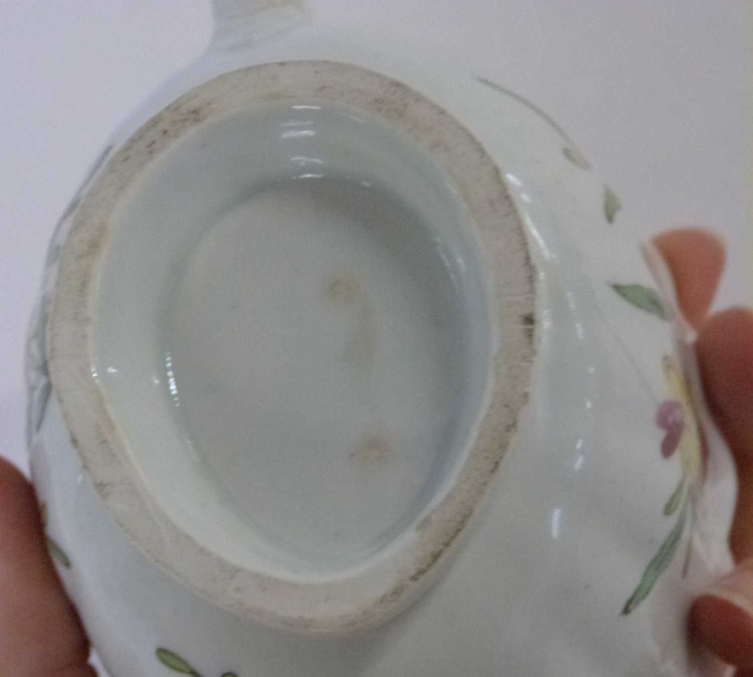 An 18th Century Bow porcelain sauce boat of ribbed form with floral decoration (hairline), 18cm - Image 3 of 3