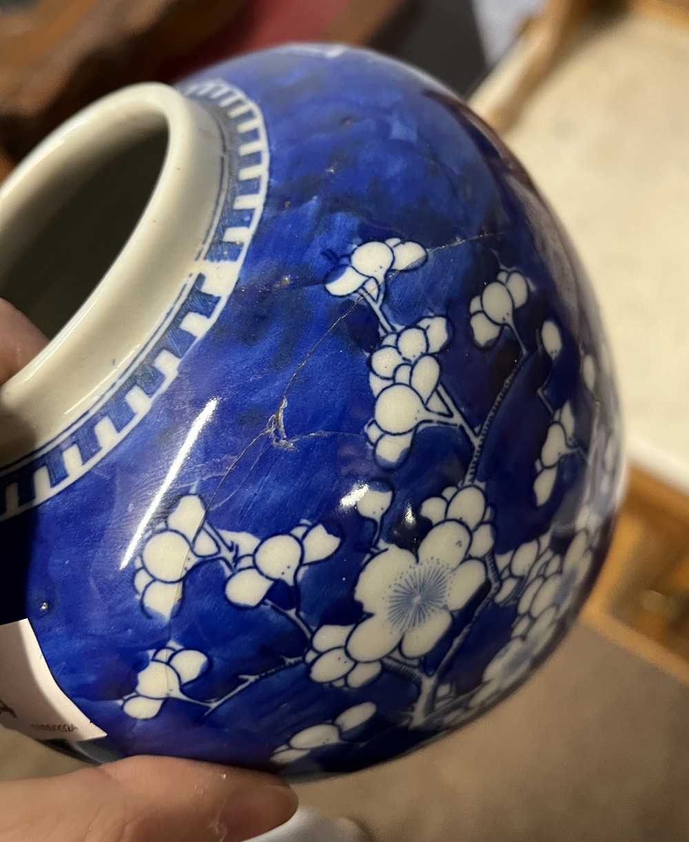 A Chinese porcelain ginger jar 19th Century, the blue ground with prunus decoration, four - Image 7 of 11