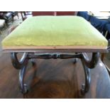 A small Victorian footstool with mahogany frame with X formed ends and green upholstered top, 46cm