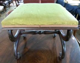 A small Victorian footstool with mahogany frame with X formed ends and green upholstered top, 46cm