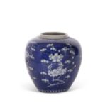 A Chinese porcelain ginger jar 19th Century, the blue ground with prunus decoration, four
