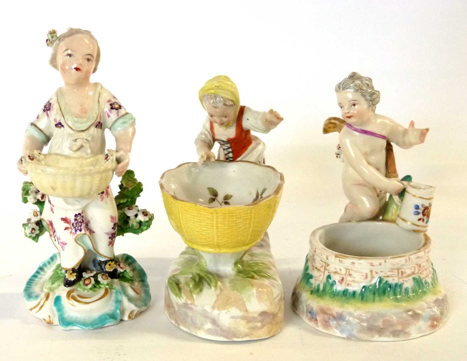 A group of three 18th/19th Century English and continental porcelain salts including a Derby example