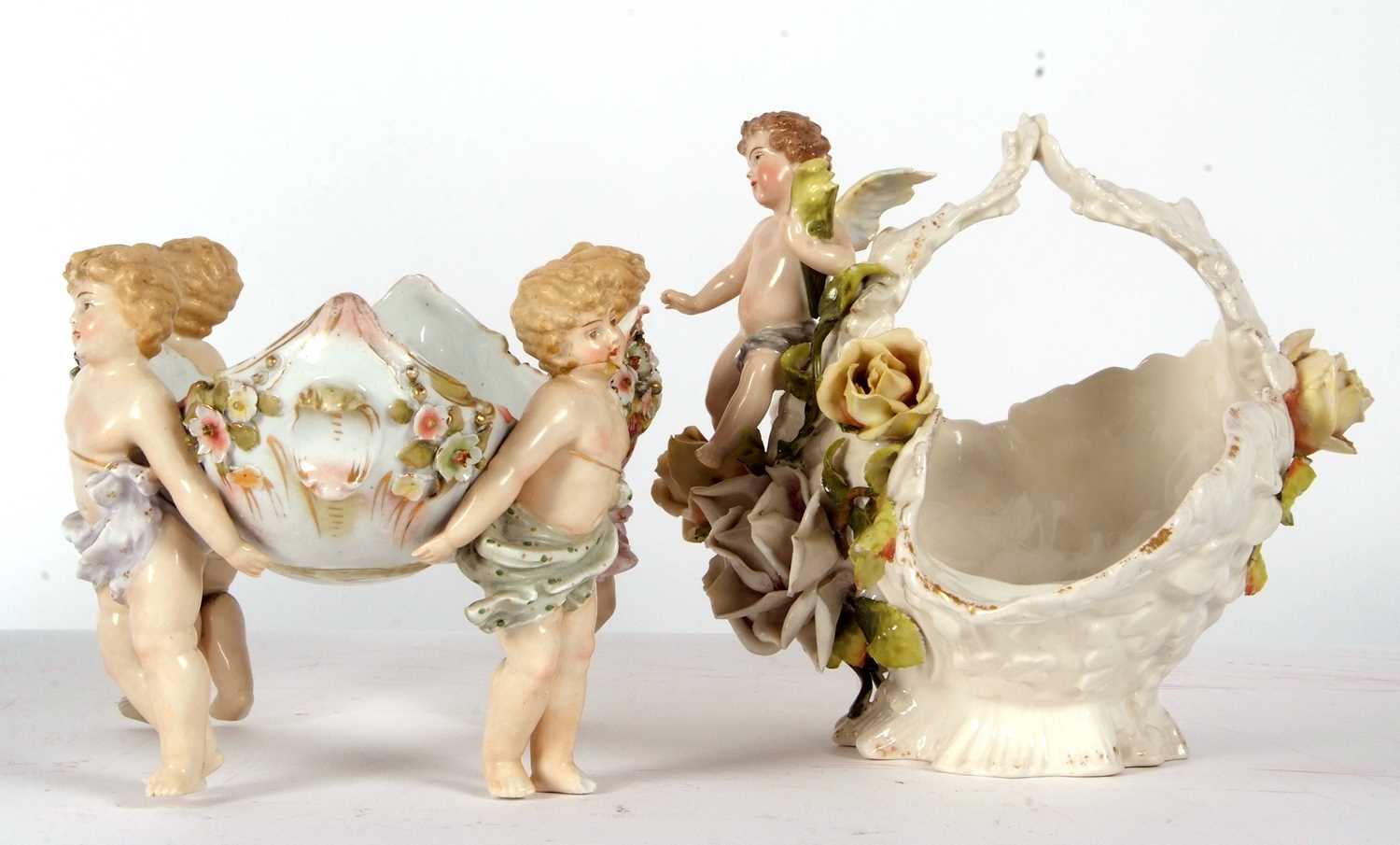 Two continental porcelain baskets one Sitzendorf with applied flowers and cherubs together with a - Image 3 of 11