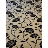 A pair of beige and black floral velour patterned curtains, lined, each approx. 152cm wide by