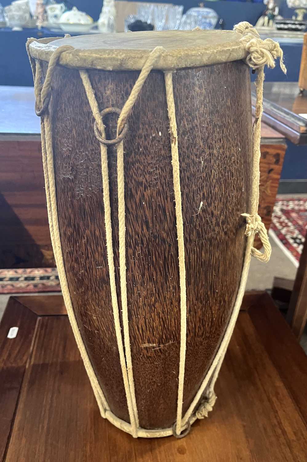 A small hide covered hardwood double ended drum, 25cm high - Image 3 of 3