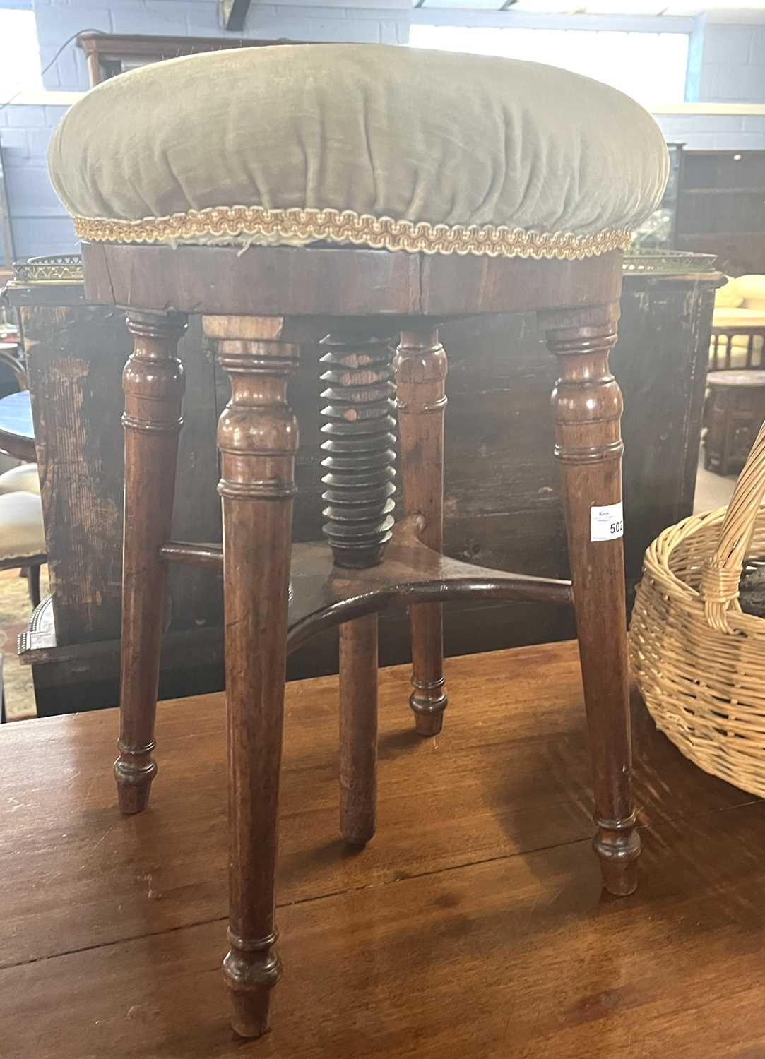 A Victorian circular topped adjustable stool on tapering legs, 50cm high - Image 3 of 3