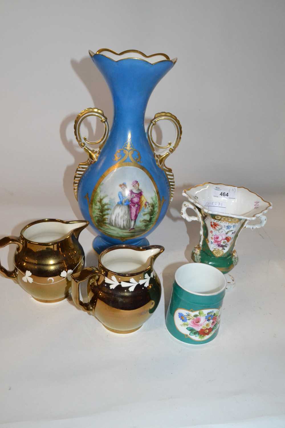 A group of late 19th Century ceramics including an English spill vase painted with flowers, two