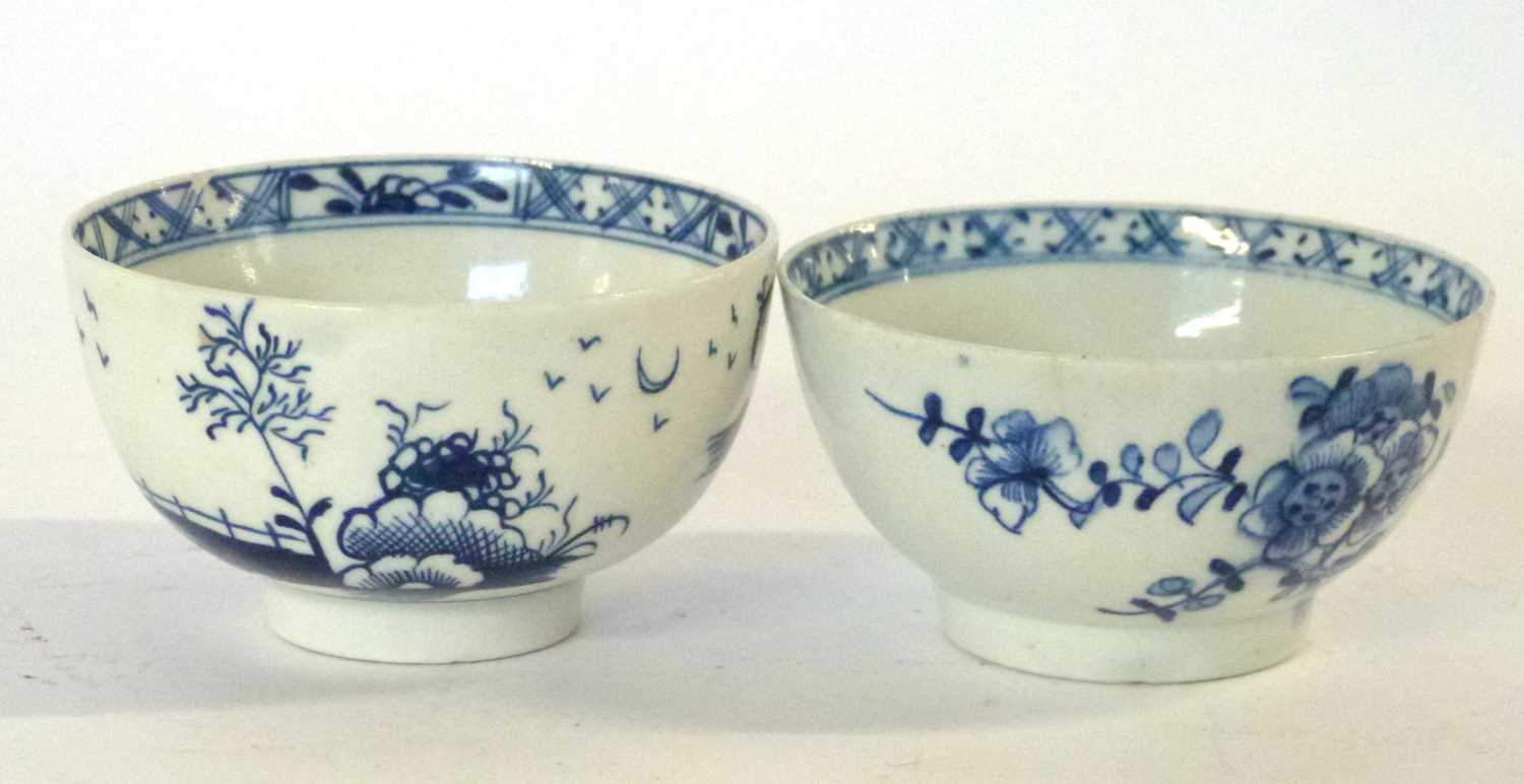 Two 18th Century Lowestoft porcelain tea bowls, both with painted root pattern and chinoiserie