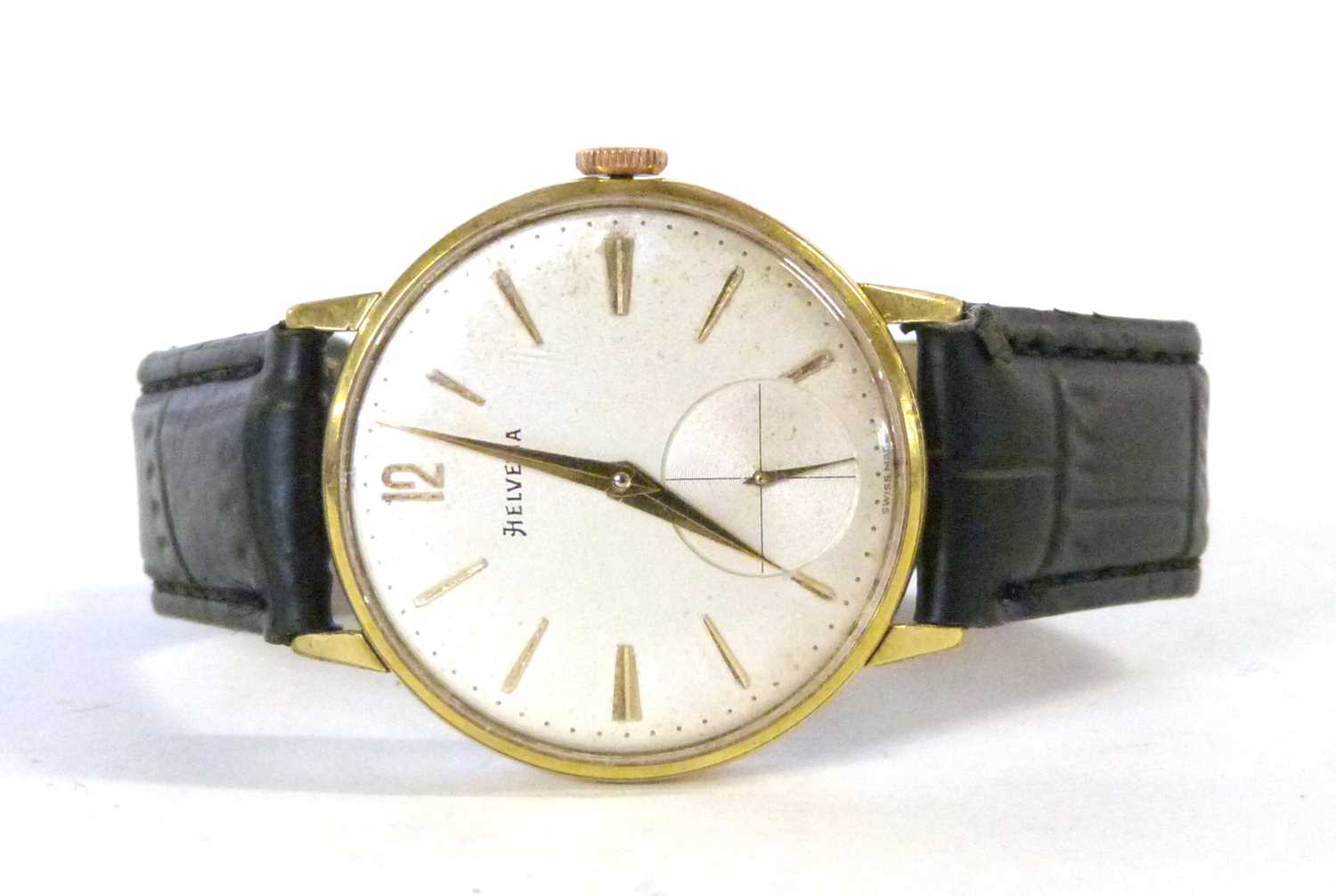 A 1960's Swiss Helvetia gentleman's skeleton-back wristwatch, with arrow hands and baton markers,