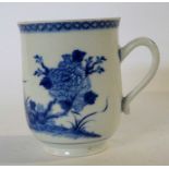 A 18th Century Chinese export porcelain tankard with blue and white design (large chip to rim),