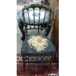 A Victorian ebonised and gilt painted side chair with spindle turned back and tapestry seat, 87cm