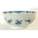 An 18th Century Worcester porcelain punch bowl the moulded body painted in blue with the rare