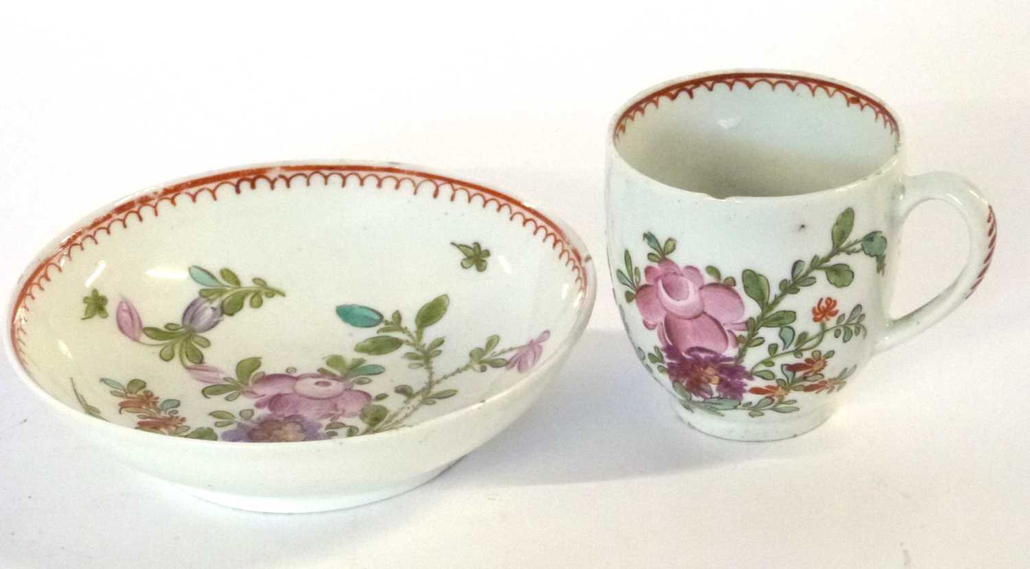 An 18th Century lustre porcelain cup and saucer decorated in Curtis style with flowers (chip to