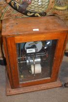 Cased scientific water flow meter from a coalmine set in a hardwood case with glazed door, one