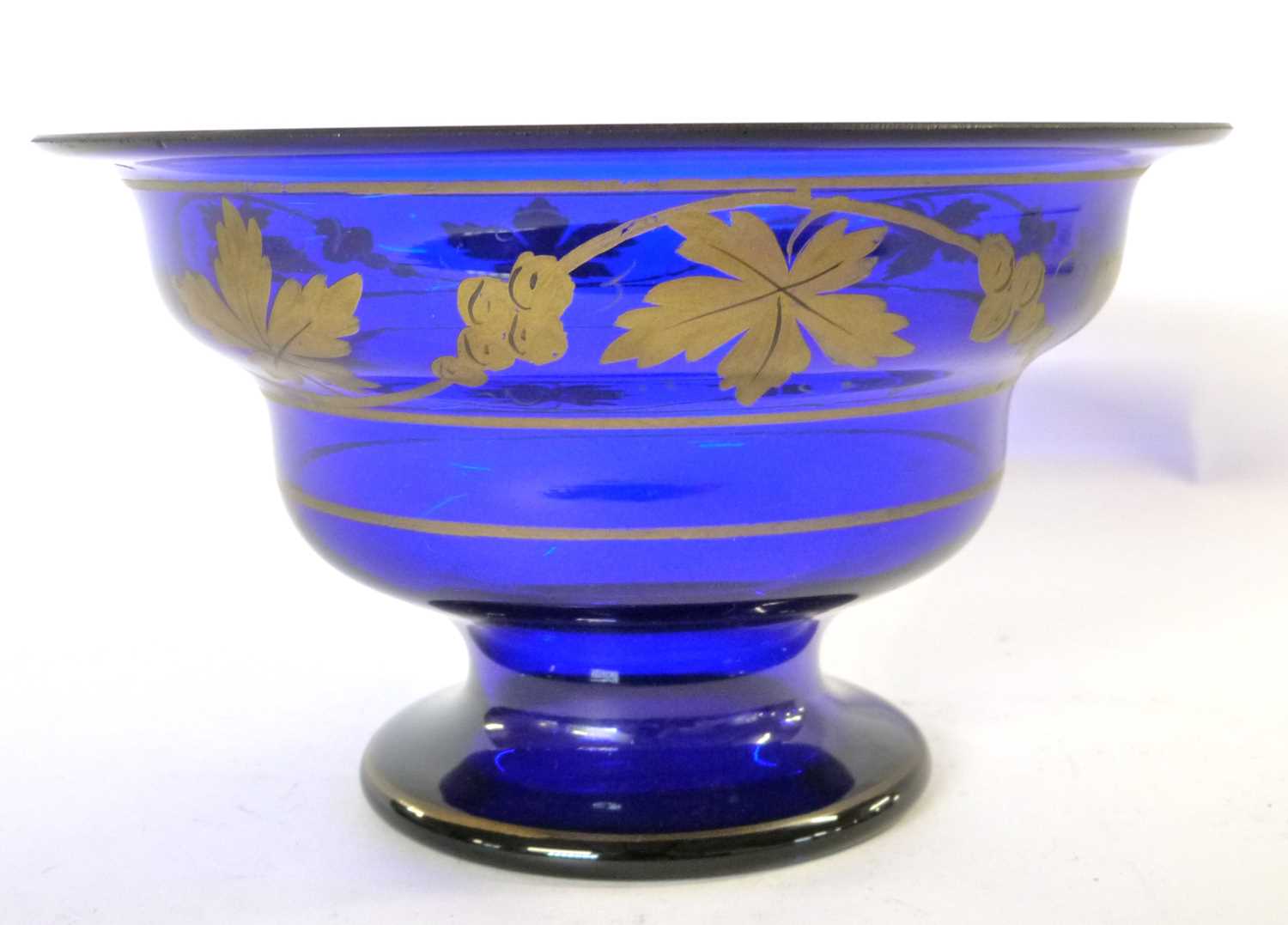 A 19th century Bristol blue bowl, gilt with vine decoration