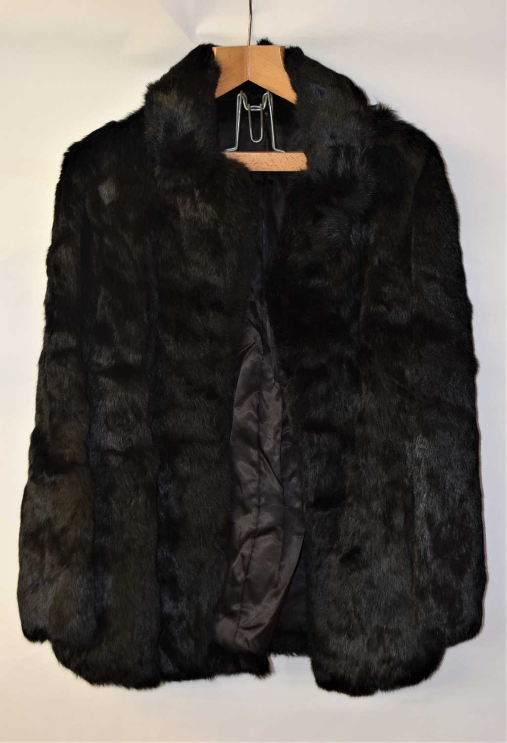 A lady's black rabbit fur jacket