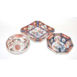 Group of Japanese porcelain including a dish with Imari designs, further bowl and one other, the