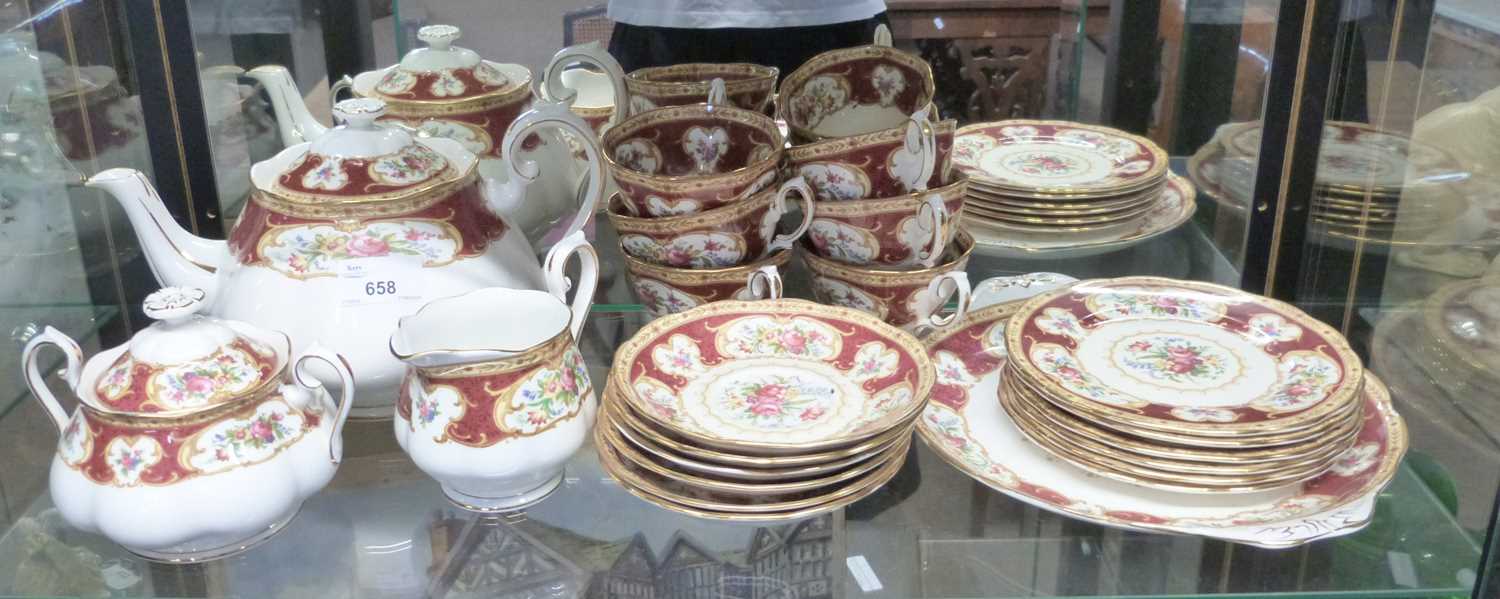 A Royal Albert tea set in the Lady Hamilton pattern comprising teapot, milk jug, sucrier and