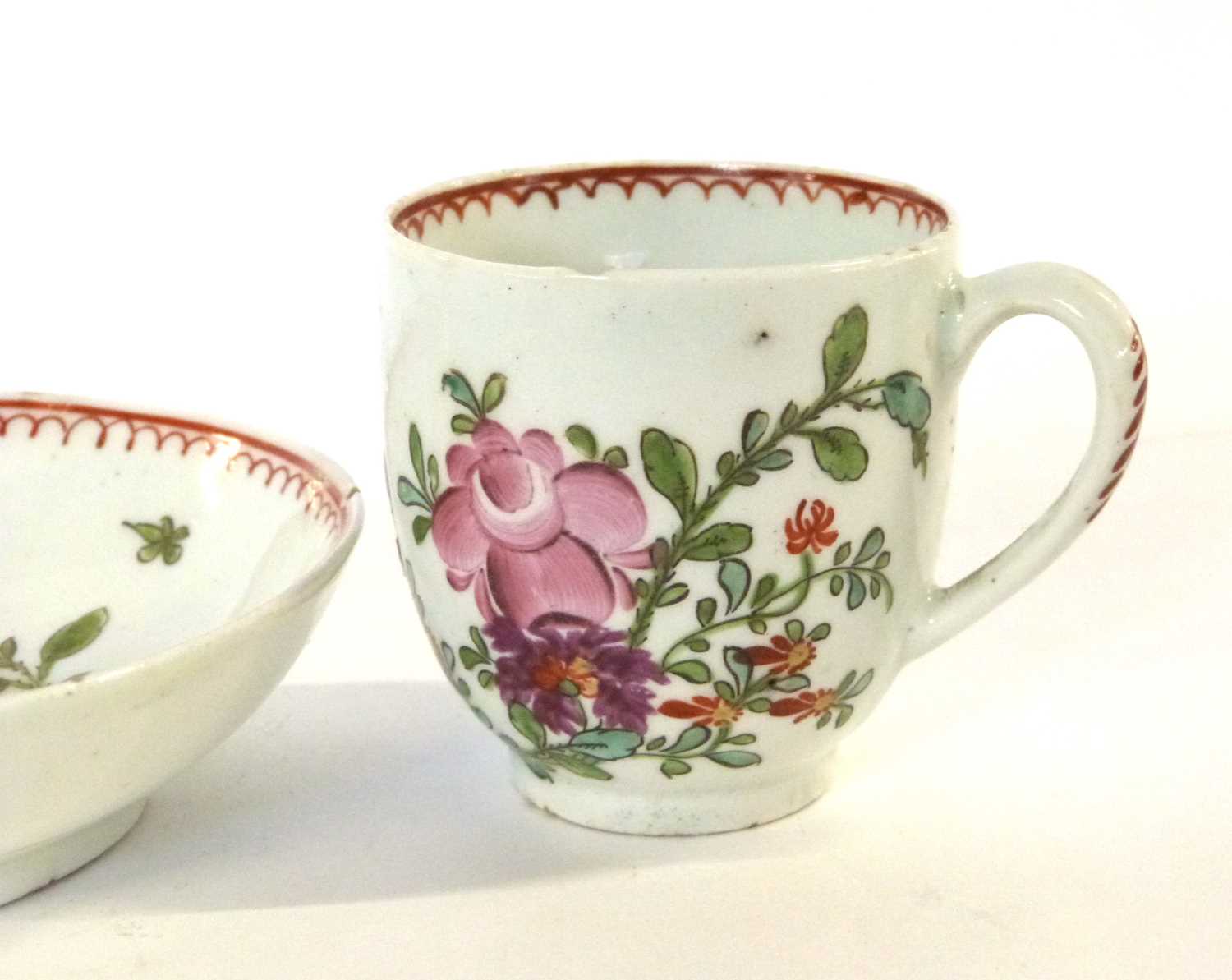 An 18th Century lustre porcelain cup and saucer decorated in Curtis style with flowers (chip to - Image 3 of 4