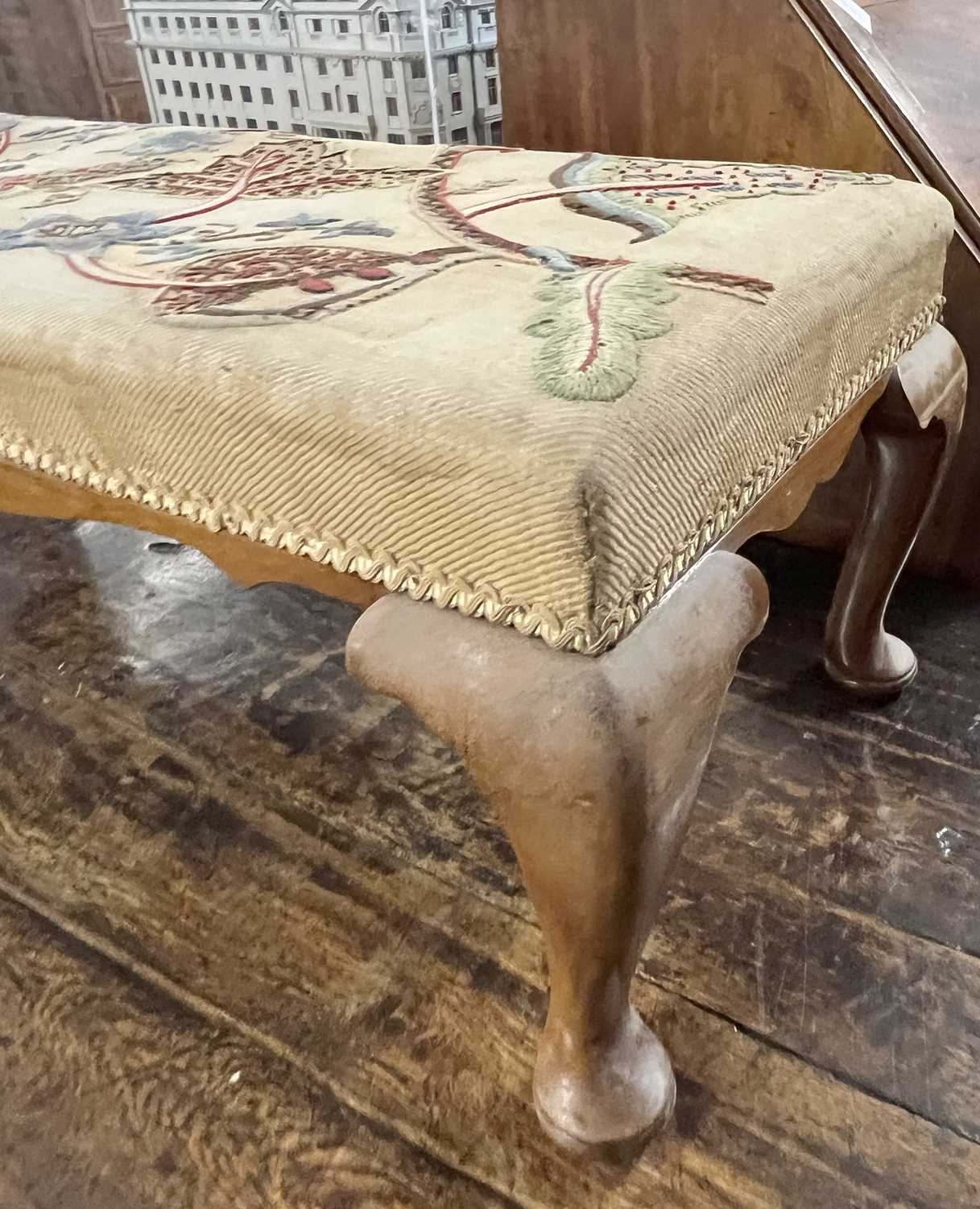 An early 20th Century rectangular footstool in the Georgian style with a floral needlework covering, - Image 3 of 3