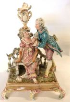 19th Century French Pottery Group of a courting couple decorated in majolica glazes on a rectangular