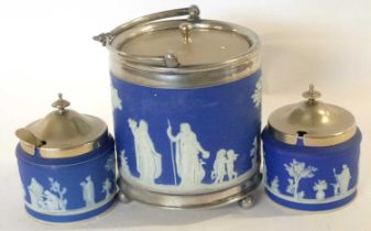 A blue jasper ware biscuit barrel with plated mounts together with two blue jasper ware jam pots
