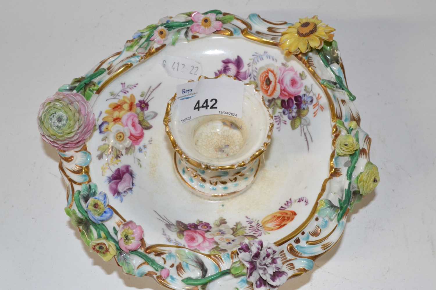 A 19th Century porcelain candle holder painted with floral sprays and flowers in relief - Image 2 of 3