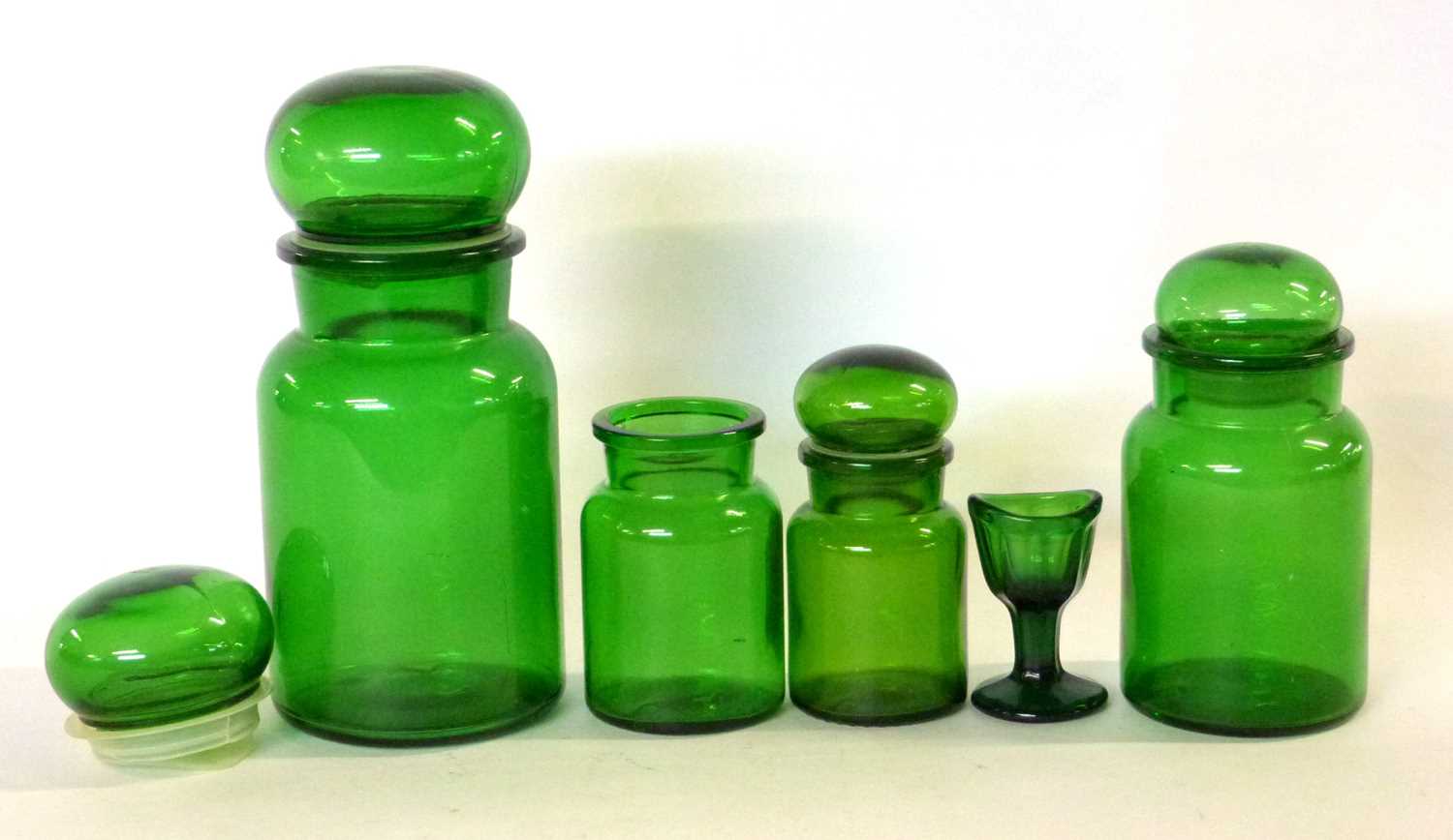 Group of green glass jars and a small eye bath - Image 2 of 3