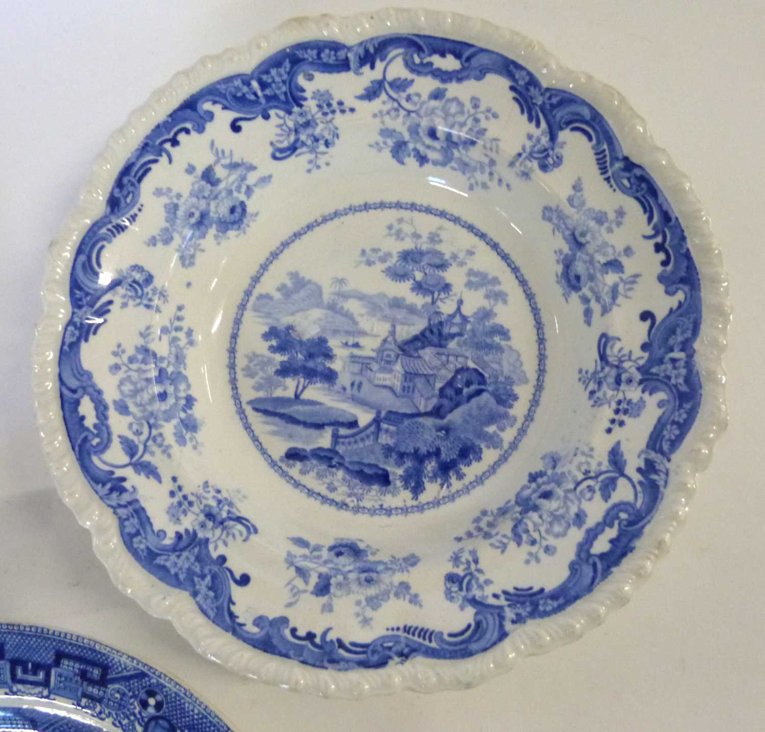 A group of Staffordshire wares including a Chinese marine scene, a Minton blue and white plate and - Image 3 of 5
