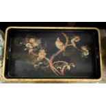 A Chinese black lacquered serving tray with bird decoration 22cm wide