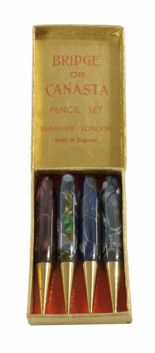 1 1930's/40's Burnham boxed set of four torpedo shaped Canasta or Bridge pencils, each in