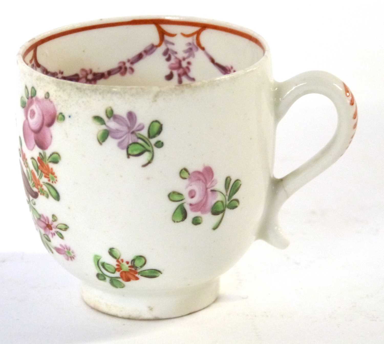 An 18th Century Lowestoft porcelain coffee cup with a polychrome Curtis style design