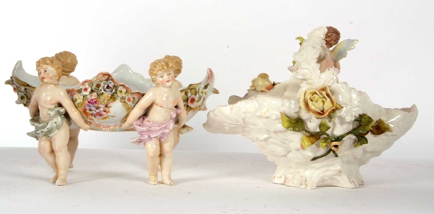Two continental porcelain baskets one Sitzendorf with applied flowers and cherubs together with a - Image 4 of 11