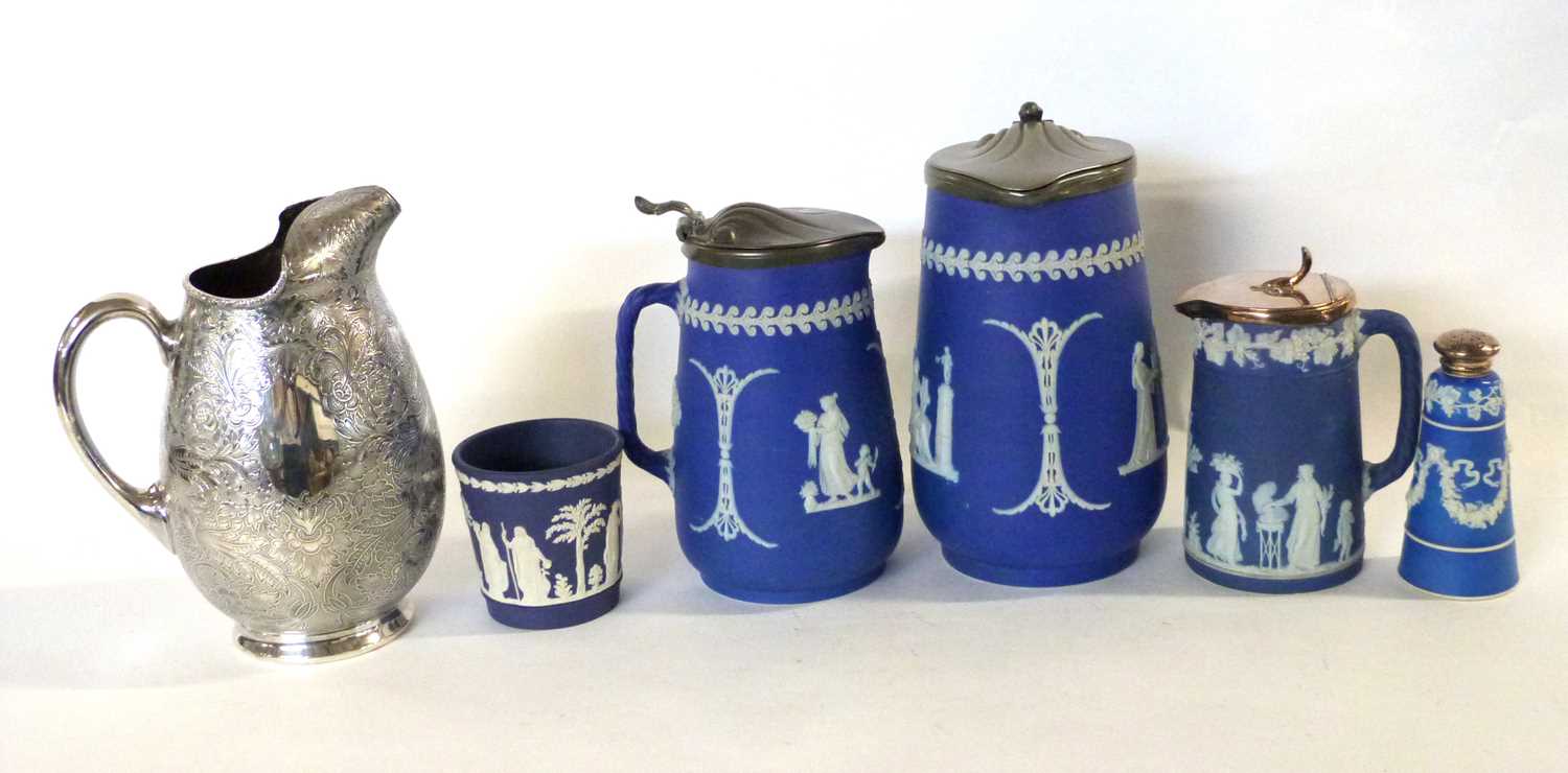 Group of late 19th Century Wedgwood blue jasper jugs of graduated size together with a small vase