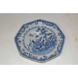 An 18th Century Chinese porcelain octagonal plate with brown line rim, blue and white chinoiserie